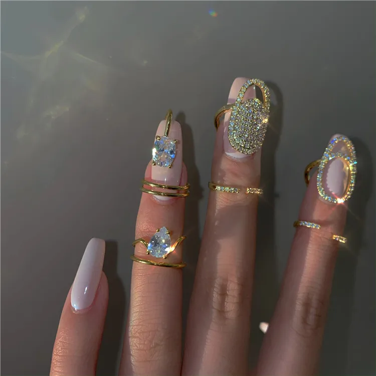 New Shining Armor Trendy Cool Hollow Meta Rhinestone Fingertip Nail Ring for Women, Clear
New Shining Armor Trendy Cool Hollow Meta Rhinestone Fingertip Nail Ring for Women, Clear