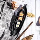 Matte black colour glazed streak snack leaf shaped sushi plate with golden and slivery pattern