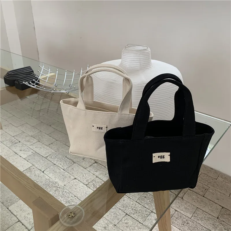 2021 summer new plain canvas handbag custom light ladies lunch bag daily tote bags wholesale, Black
2021 summer new plain canvas handbag custom light ladies lunch bag daily tote bags wholesale, Black