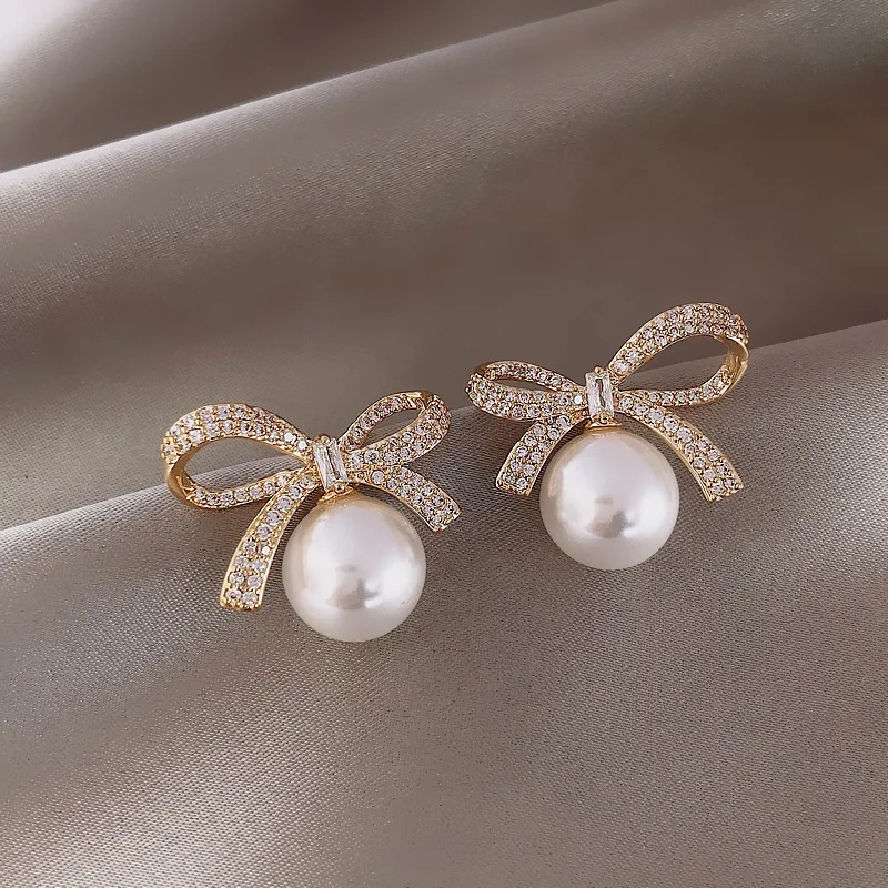 JuhU 925 Silver Needle Diamond Bow Pearl Earrings Female 2021 Trendy Korean Sweet Earrings, Bow pearl earrings -925 silver needle
JuhU 925 Silver Needle Diamond Bow Pearl Earrings Female 2021 Trendy Korean Sweet Earrings, Bow pearl earrings -925 silver needle
