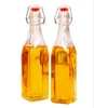 Wholesale factory direct high quality cheap glass beer bottle with swing top