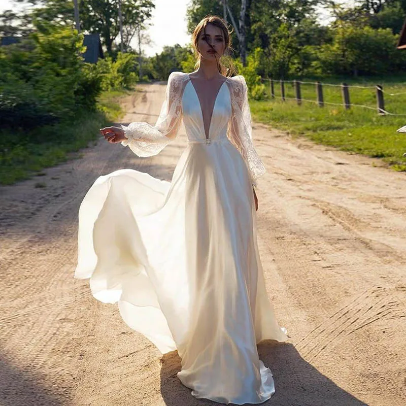 Ladies sexy deep V neck lantern sleeve elegant dress long skirt lace stitching long sleeve dress, White
Ladies sexy deep V neck lantern sleeve elegant dress long skirt lace stitching long sleeve dress, White