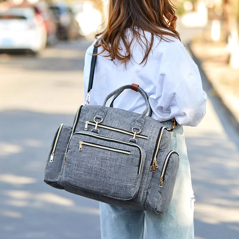 Gray large 21L oxford stylish built in USB charging port with changing pad waterproof baby diaper bag backpack
Gray large 21L oxford stylish built in USB charging port with changing pad waterproof baby diaper bag backpack