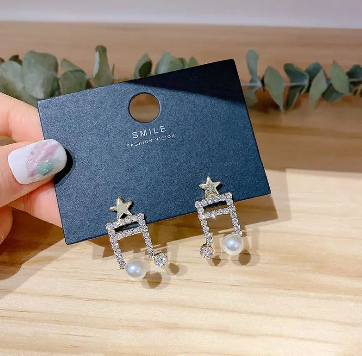 Korea vintage musical note pearl earrings female trend ins diamond earrings S925 silver post earrings jewelry
Korea vintage musical note pearl earrings female trend ins diamond earrings S925 silver post earrings jewelry