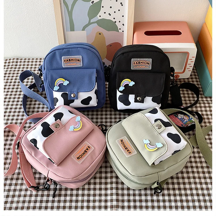 Wholesale Fashion Small Travel Nylon Shoulder Bag Cartoon Style Canvas Bag Zipper Canvas Bags With Cow Pattern
Wholesale Fashion Small Travel Nylon Shoulder Bag Cartoon Style Canvas Bag Zipper Canvas Bags With Cow Pattern