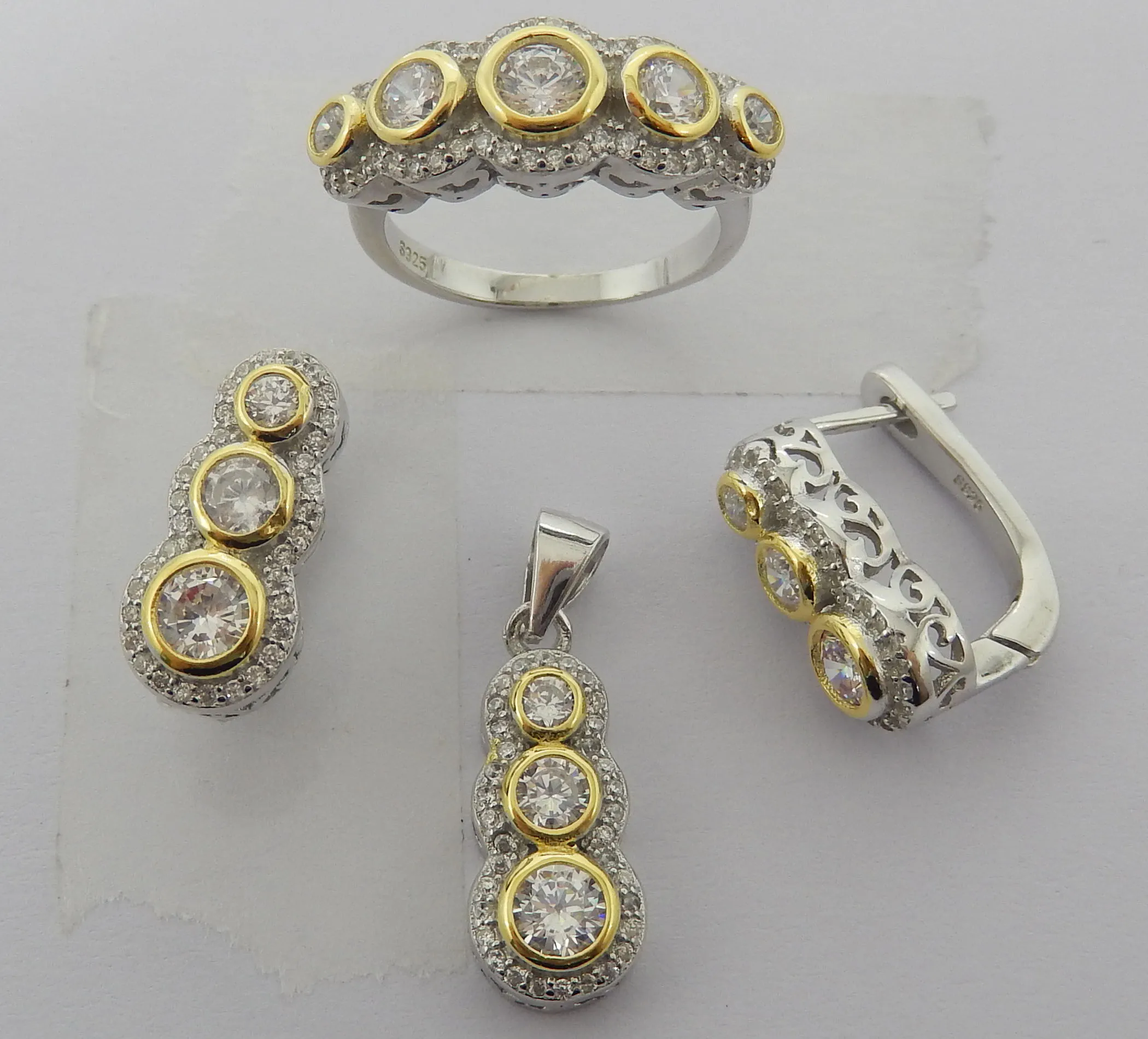 DiFeiYa 8 shape gold plated sterling silver earrings zircon ring pendant jewelry set
DiFeiYa 8 shape gold plated sterling silver earrings zircon ring pendant jewelry set