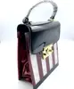 /product-detail/popular-acrylic-pu-bag-clutch-bag-hand-bag-with-metal-lock-for-lady-62335469539.html