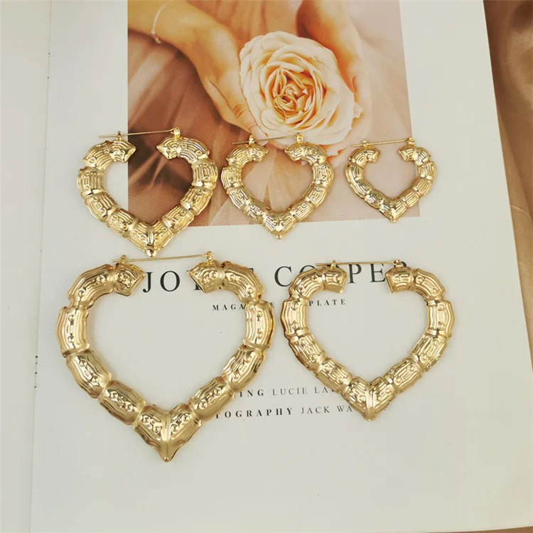Hot Sale Hyperbole Large Bamboo Hoop Earring Hollow Casting 14k Gold Thick Heart Hoop Earrings Hip Hop Statement Jewelry for Wom
Hot Sale Hyperbole Large Bamboo Hoop Earring Hollow Casting 14k Gold Thick Heart Hoop Earrings Hip Hop Statement Jewelry for Wom