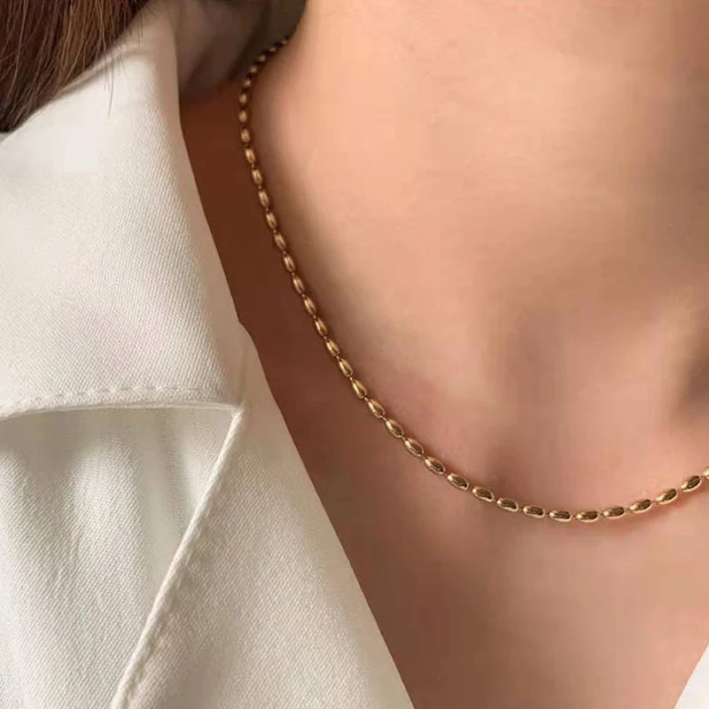 18K Gold Plated Rice Beads Chain Choker Necklace For Women Stainless Steel Jewelry Wholesale
18K Gold Plated Rice Beads Chain Choker Necklace For Women Stainless Steel Jewelry Wholesale