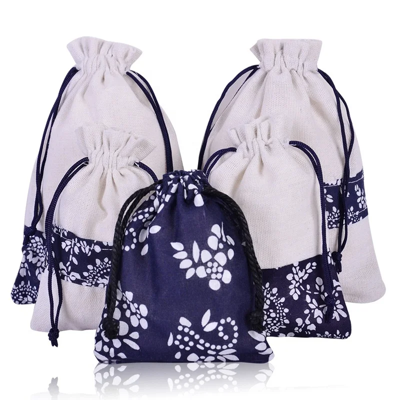 Customized printing cotton drawstring bag fabric gift drawstring bags with logo 
Customized printing cotton drawstring bag fabric gift drawstring bags with logo