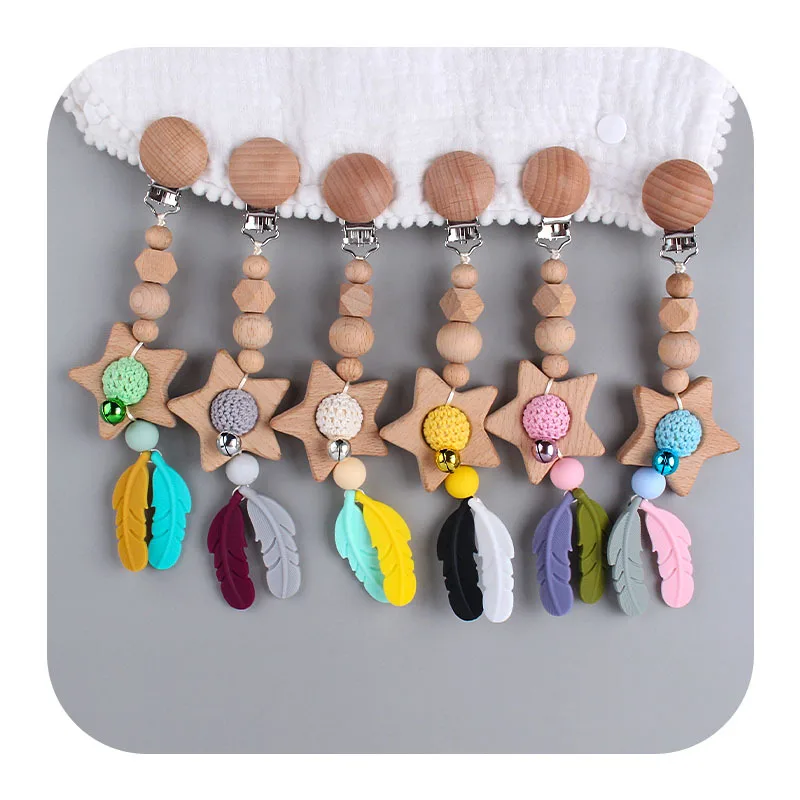 Wholesale Silicone Feather Wood Star Teether Baby Pacifier Clip Infant Stroller Hang Decorations
Wholesale Silicone Feather Wood Star Teether Baby Pacifier Clip Infant Stroller Hang Decorations