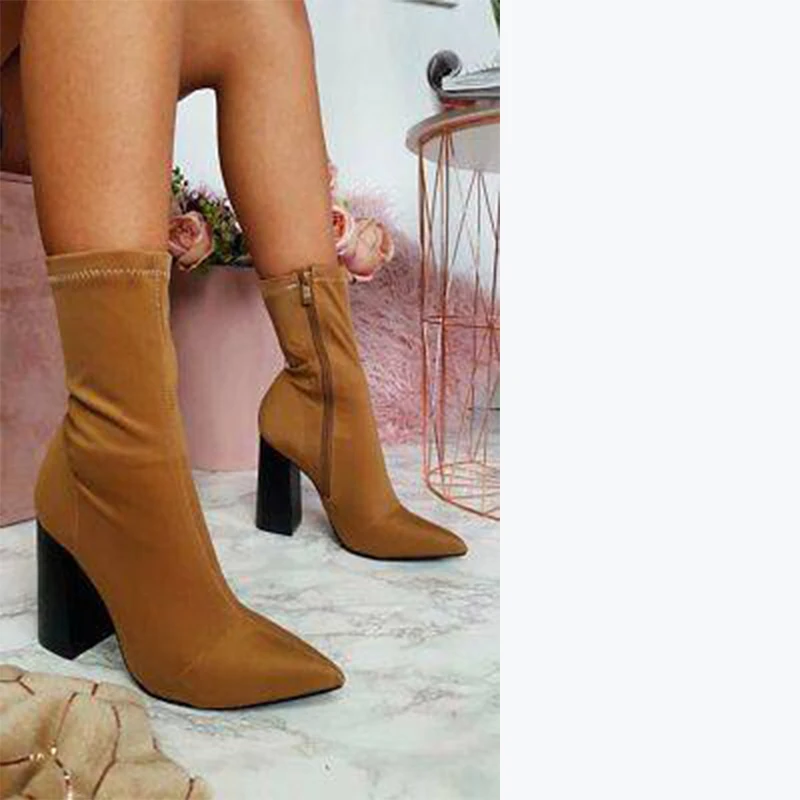 Fashion new fashion Brown elastic boots high thick heel middle tube pointed ankle boots are made in size 40
Fashion new fashion Brown elastic boots high thick heel middle tube pointed ankle boots are made in size 40