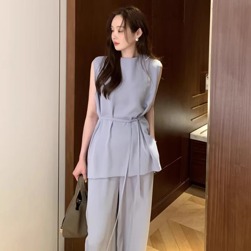 Wholesale 2023 Summer French Premium Sleeveless Shirt Top High Waist Dropped Wide Leg Casual Pants Women's Set
Wholesale 2023 Summer French Premium Sleeveless Shirt Top High Waist Dropped Wide Leg Casual Pants Women's Set