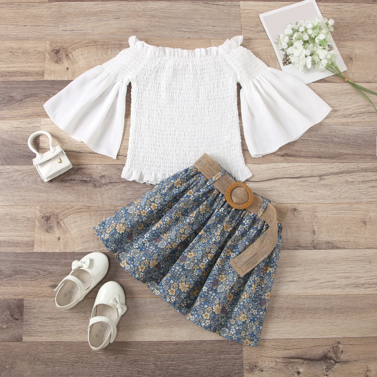 2021 New Spring Summer Girl Outfit Set Cute White Off the Shoulder Shirt +Floral Skirt with Belt 2 pcs Fashion Girl Set
2021 New Spring Summer Girl Outfit Set Cute White Off the Shoulder Shirt +Floral Skirt with Belt 2 pcs Fashion Girl Set