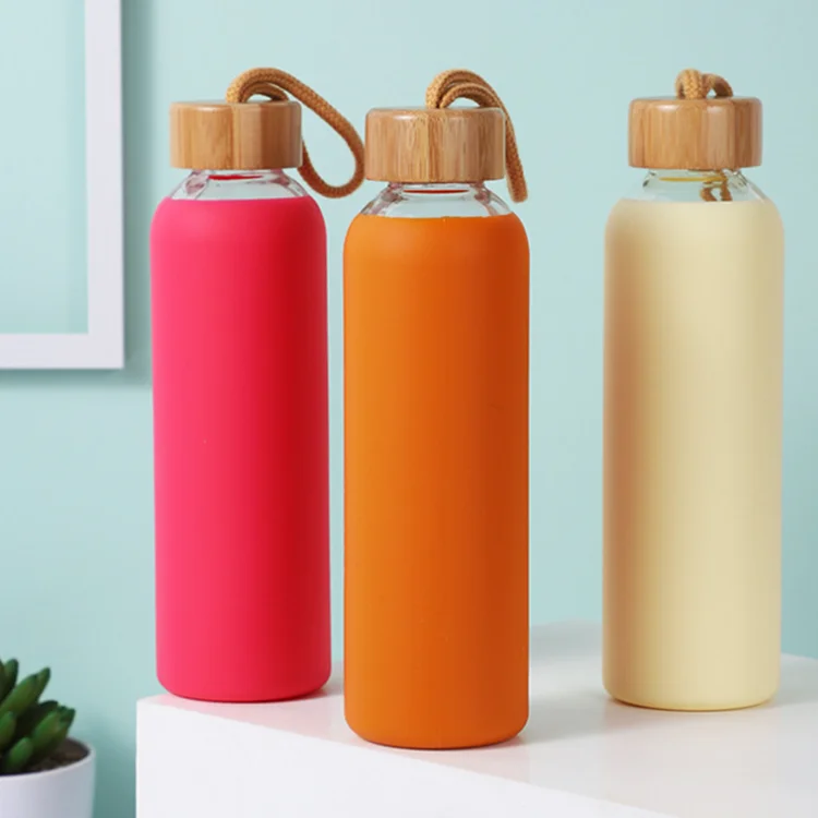 Customized logo High quality glass water bottle with bamboo lid and silicone sleeve, Clear
Customized logo High quality glass water bottle with bamboo lid and silicone sleeve, Clear