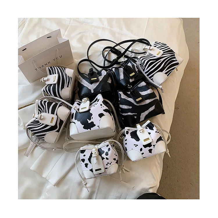 Trendy Chunky Small Crossbody Bags Cute Zebra and Cow Prints Drawstring Bucket Bags Casual Female Mini PU Handbags and Purses
Trendy Chunky Small Crossbody Bags Cute Zebra and Cow Prints Drawstring Bucket Bags Casual Female Mini PU Handbags and Purses