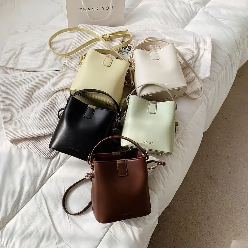 New Pure Color Cute Female Bucket Bag Simple and Generous Good Capacity Cross-body Handbag Pvc Purse
New Pure Color Cute Female Bucket Bag Simple and Generous Good Capacity Cross-body Handbag Pvc Purse