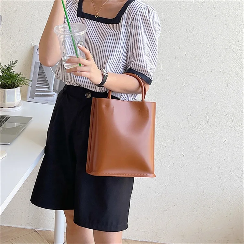 Korean Summer Edition New Women's Simple Handbag Fashion Trend Handbag PU Large Capacity Vertical Style Small Square Bag
Korean Summer Edition New Women's Simple Handbag Fashion Trend Handbag PU Large Capacity Vertical Style Small Square Bag