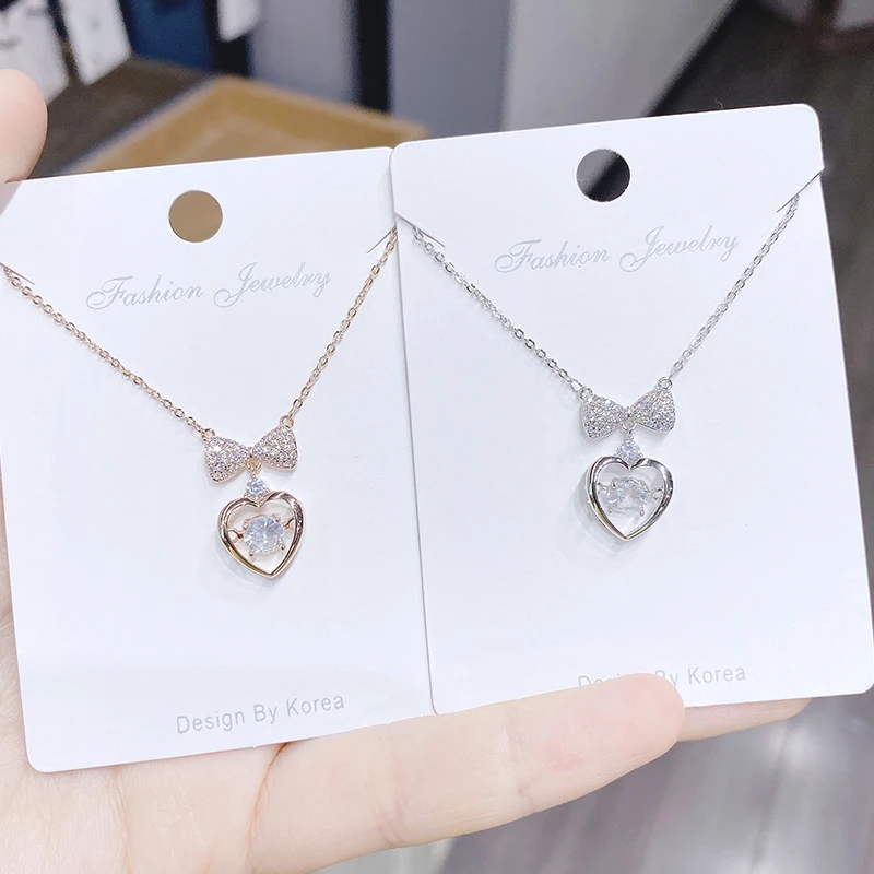 XL60650 Fashion pink girl style jewelry cute bowknot heart shape zircon pendant brass rose gold plated charm girl necklace, Rose gold/platinum color
XL60650 Fashion pink girl style jewelry cute bowknot heart shape zircon pendant brass rose gold plated charm girl necklace, Rose gold/platinum color