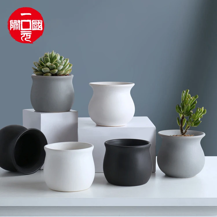 Creative design High Quality Modern Concrete decor black white ceramic flower pot planters set
Creative design High Quality Modern Concrete decor black white ceramic flower pot planters set
