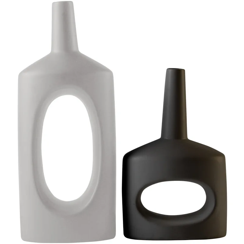 Black and White Simple Modern Simple Model Room Living Room Home Decoration Crafts Vase Decoration Wholesale
Black and White Simple Modern Simple Model Room Living Room Home Decoration Crafts Vase Decoration Wholesale