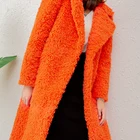 Women's fur coat colored wool long and wide coat