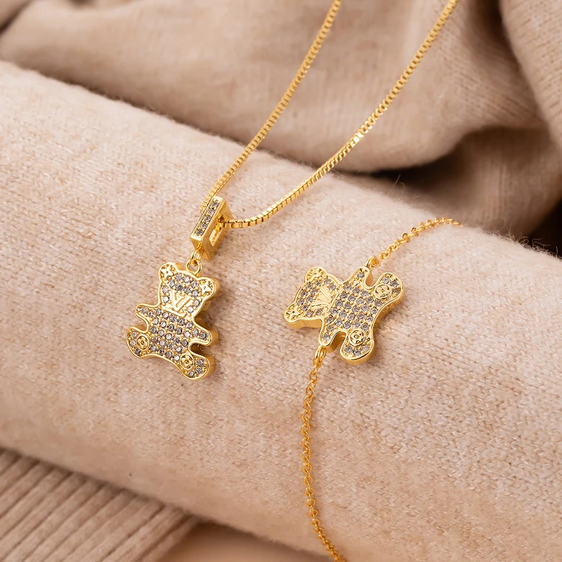Custom necklace trend 2021 brass gold plated women's charm jewelry Teddy Bear Necklace Set
Custom necklace trend 2021 brass gold plated women's charm jewelry Teddy Bear Necklace Set