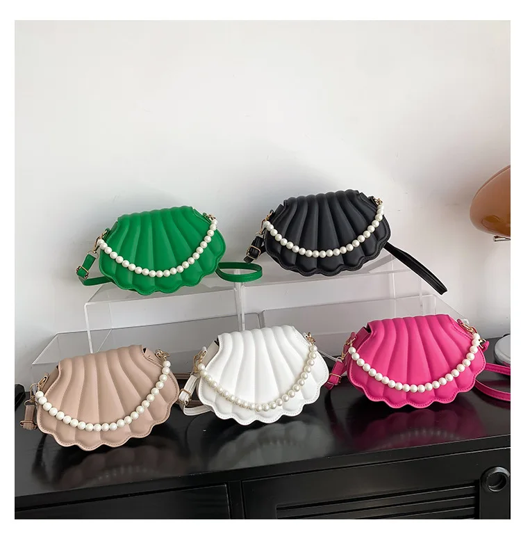 Hot Selling New Shell Shape Woman Single Shoulder Bag with Pearl Chain Fashion PU Leather Woman Handbag Bag Cute Crossbody bag
Hot Selling New Shell Shape Woman Single Shoulder Bag with Pearl Chain Fashion PU Leather Woman Handbag Bag Cute Crossbody bag