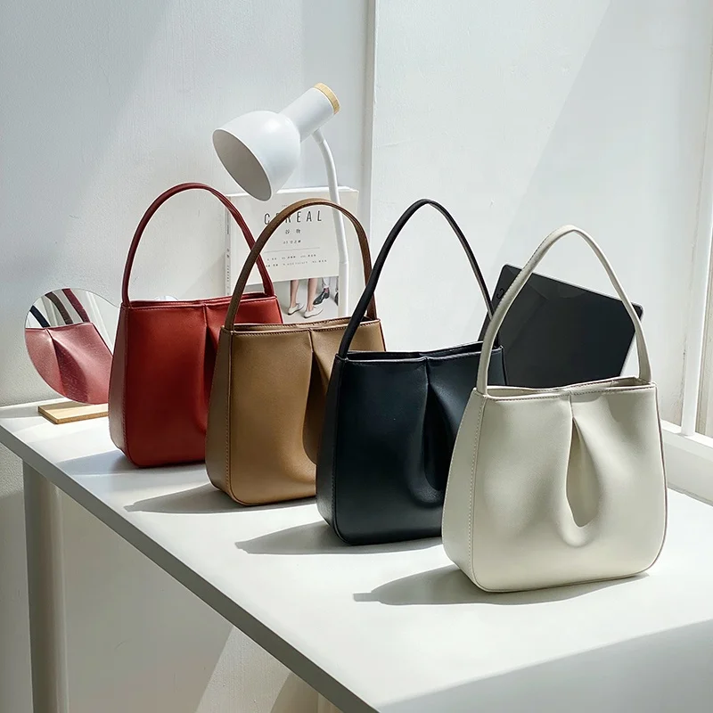 Korean version of the new female bag PU simple retro temperament handbag fashion trend creative design small square bag
Korean version of the new female bag PU simple retro temperament handbag fashion trend creative design small square bag