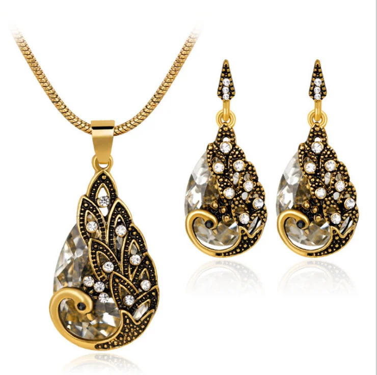 Boho Simple Elegant Teardrop Stone Peacock Pendant Necklace Earring Set Colorful Crystal Peacock Jewelry Set For Women
Boho Simple Elegant Teardrop Stone Peacock Pendant Necklace Earring Set Colorful Crystal Peacock Jewelry Set For Women