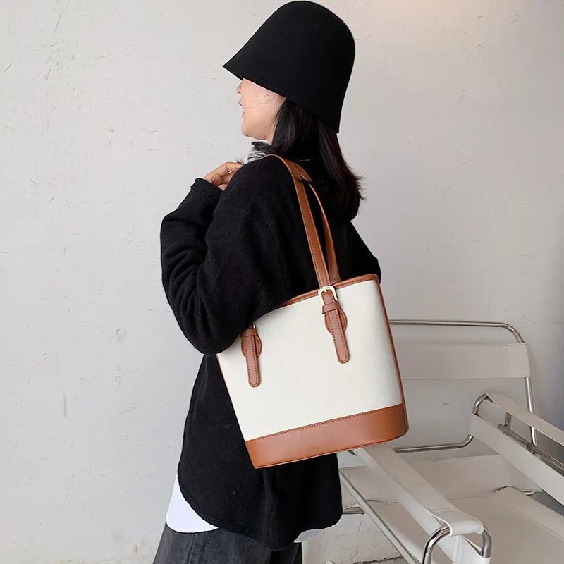Autumn new European and American style versatile canvas contrast color bucket bag shoulder crossbody women's bag wholesale
Autumn new European and American style versatile canvas contrast color bucket bag shoulder crossbody women's bag wholesale