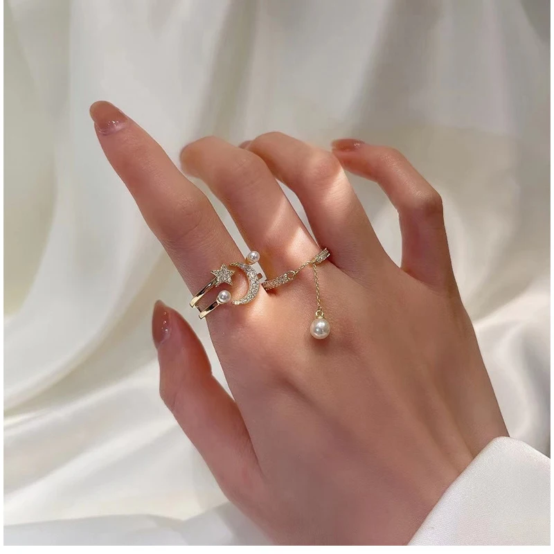 Female Elegant Design Jewelry Gold Plated Shining Moon and Star Pearl Zircon Alloy Ring
Female Elegant Design Jewelry Gold Plated Shining Moon and Star Pearl Zircon Alloy Ring