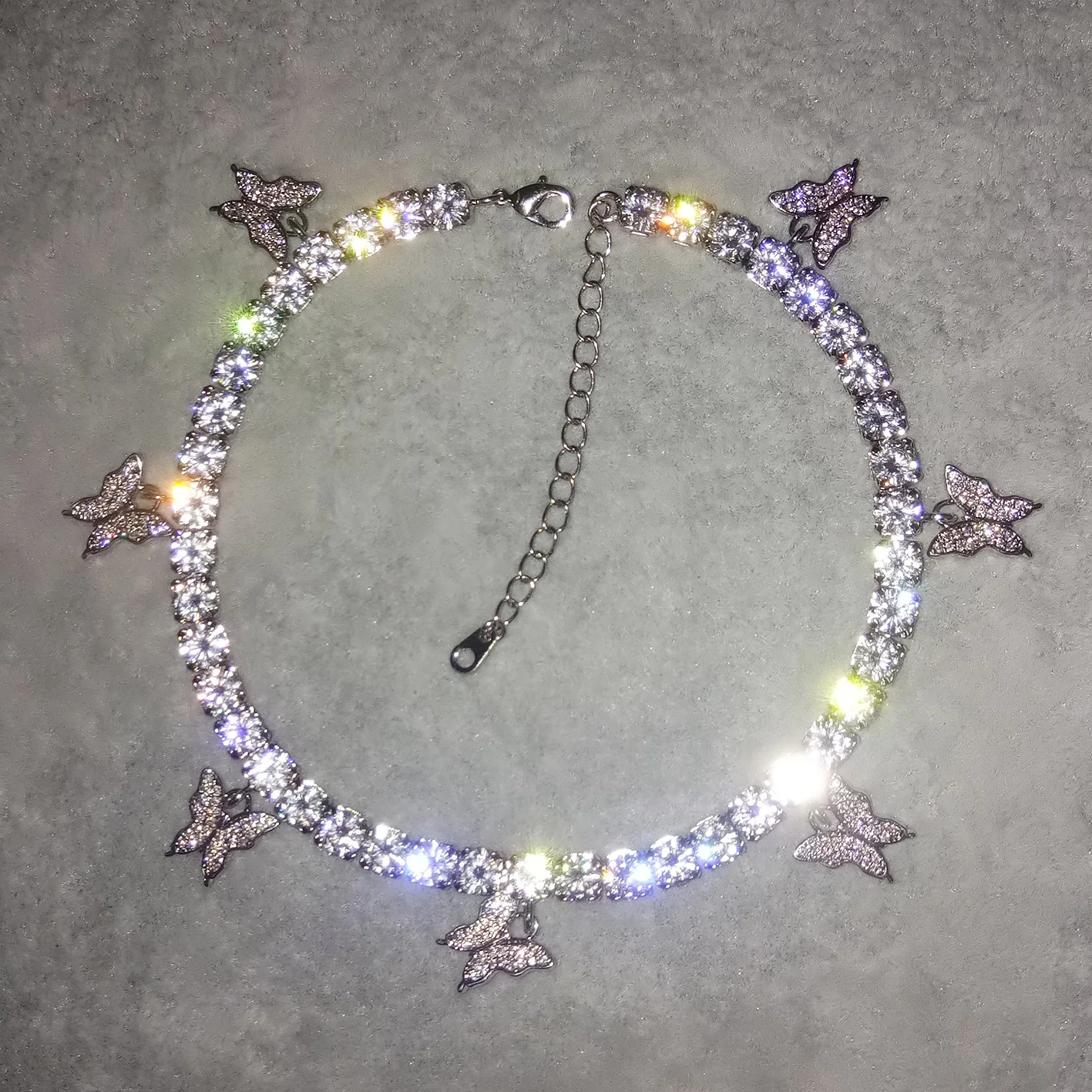 iced out diamond 5mm pink diamond tennis chain silver butterfly anklet foot jewelry 
iced out diamond 5mm pink diamond tennis chain silver butterfly anklet foot jewelry