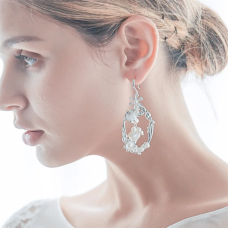 2021 New Baroque Vintage Shell Pearl Earrings Handmade Silver Drop Dangle Long Bridal Earrings Creative Wedding Earrings
2021 New Baroque Vintage Shell Pearl Earrings Handmade Silver Drop Dangle Long Bridal Earrings Creative Wedding Earrings