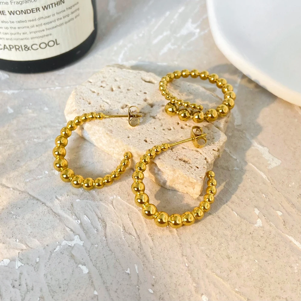 Trend Gradient Small Round Beads Gold Plated C-shaped Earrings ring Stainless Steel Jewelry Stud Earrings and ring For Gift
Trend Gradient Small Round Beads Gold Plated C-shaped Earrings ring Stainless Steel Jewelry Stud Earrings and ring For Gift