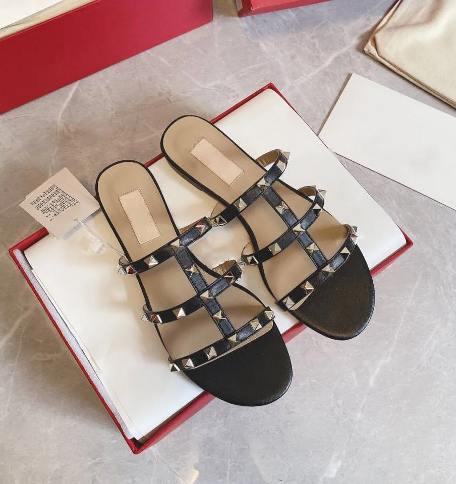 New summer hollow flat sandals for women with low heels and rivet slippers for women to wear
New summer hollow flat sandals for women with low heels and rivet slippers for women to wear