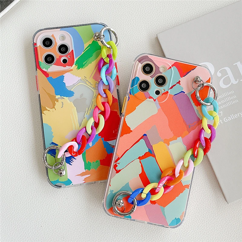 new luxury graffiti flower pattern bracelet chain wrist strap phone case for iphone 11 12 pro max 8 7 6 transparent tpu cover
new luxury graffiti flower pattern bracelet chain wrist strap phone case for iphone 11 12 pro max 8 7 6 transparent tpu cover