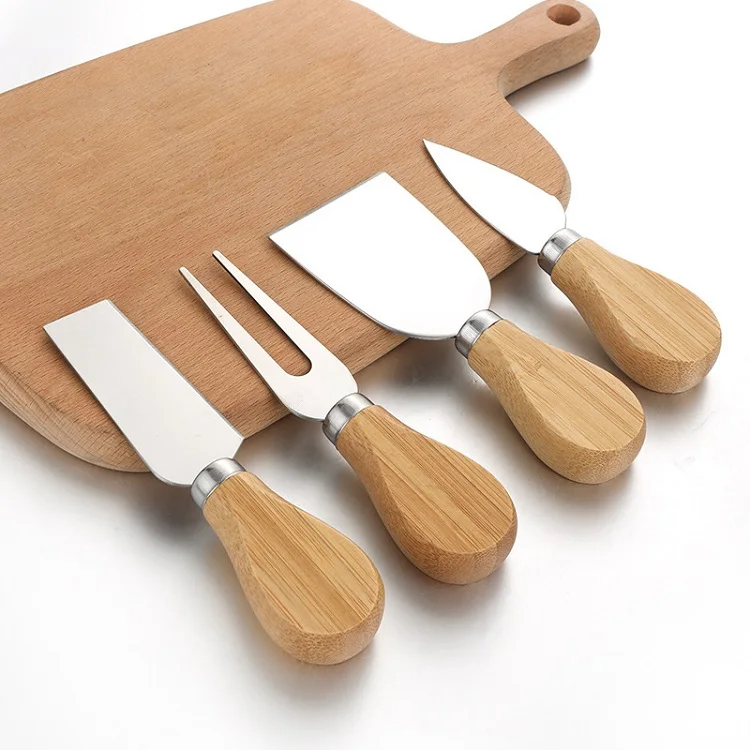 Amazon Hot sell 4pcs Cheese Knife Tool Set Unique Stainless Steel Cheese Knife Set with Wooden Handle
Amazon Hot sell 4pcs Cheese Knife Tool Set Unique Stainless Steel Cheese Knife Set with Wooden Handle
