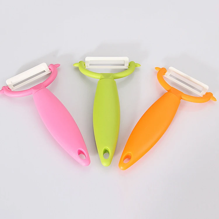Plastic handle Kitchen Swivel Ceramic Peeler Gadget for Fruits and Vegetables, Orange/pink/green
Plastic handle Kitchen Swivel Ceramic Peeler Gadget for Fruits and Vegetables, Orange/pink/green