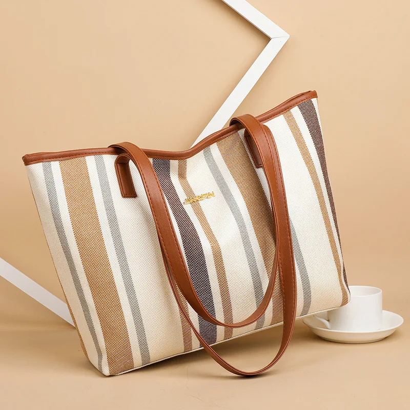 2021 Hot Selling Design Stripes Canvas Luxury Ladies Tote Hand Bags Handbag For Women, Blue, black, gray, brown
2021 Hot Selling Design Stripes Canvas Luxury Ladies Tote Hand Bags Handbag For Women, Blue, black, gray, brown
