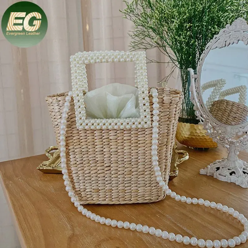 T135 square weave beaded handle pearl chain summer beach handbag natural chic bali hand woven straw bag
T135 square weave beaded handle pearl chain summer beach handbag natural chic bali hand woven straw bag