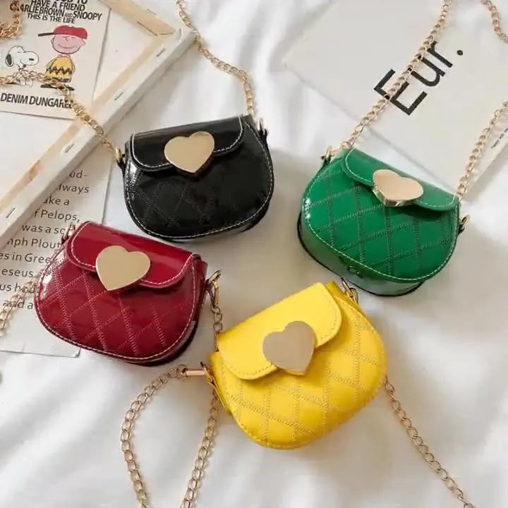 Famous brand Heart lock cute girls purses handbag pu leather kids little girl purses kids coin bag, Different colors
Famous brand Heart lock cute girls purses handbag pu leather kids little girl purses kids coin bag, Different colors