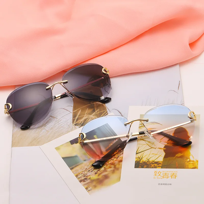SKYWAY New Trendy Frameless Ocean Lens Sunglasses Custom Logo Wholesale Oversized Metal Sun Glasses
SKYWAY New Trendy Frameless Ocean Lens Sunglasses Custom Logo Wholesale Oversized Metal Sun Glasses