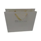 Brown kraft paper packaging bag with logo print