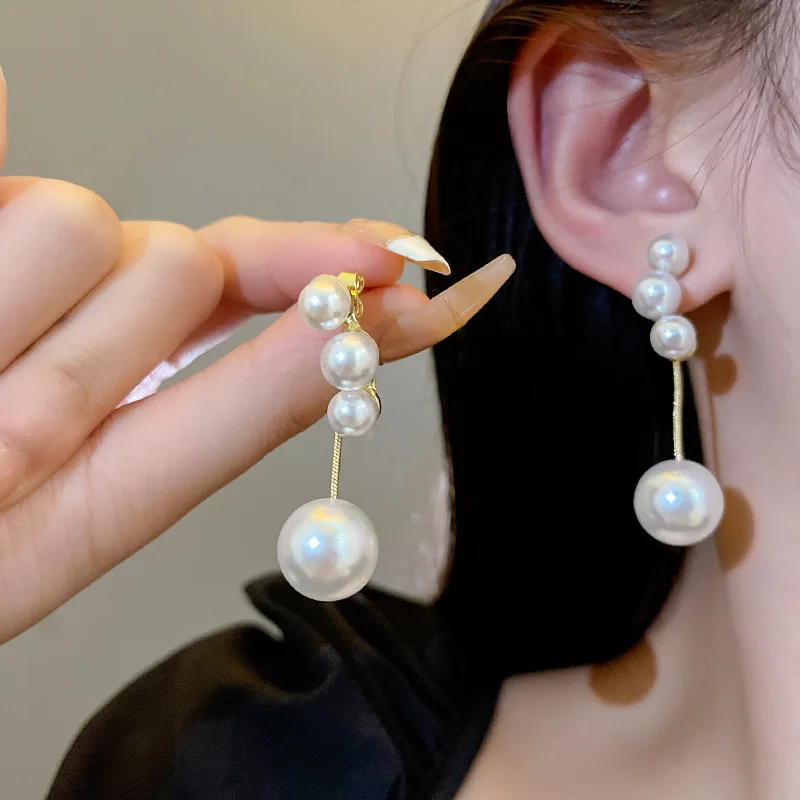 Temperament Gold Plated Geometric Retro Pearls Dangling Long Tassel Earrings Women S925 Silver Post Beaded Pearl Earrings
Temperament Gold Plated Geometric Retro Pearls Dangling Long Tassel Earrings Women S925 Silver Post Beaded Pearl Earrings