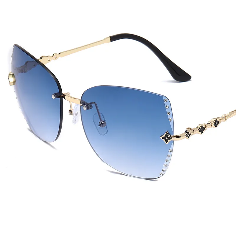 Fashion Diamond Decoration Ladies Frameless Ocean Color Sun Shades Glasses with Four Leaf Clover, 7 colors
Fashion Diamond Decoration Ladies Frameless Ocean Color Sun Shades Glasses with Four Leaf Clover, 7 colors