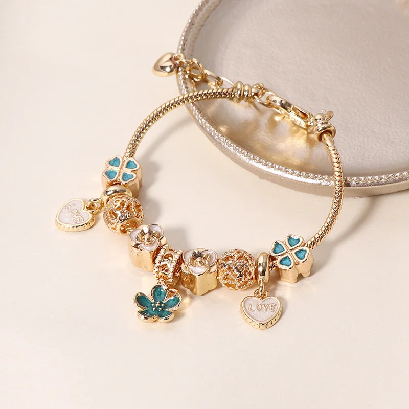 European DIY Dripping Oil Flower Charm Bracelet Women 14k Gold Plated Beaded Flower Love Heart Charm Bracelet For Gifts
European DIY Dripping Oil Flower Charm Bracelet Women 14k Gold Plated Beaded Flower Love Heart Charm Bracelet For Gifts