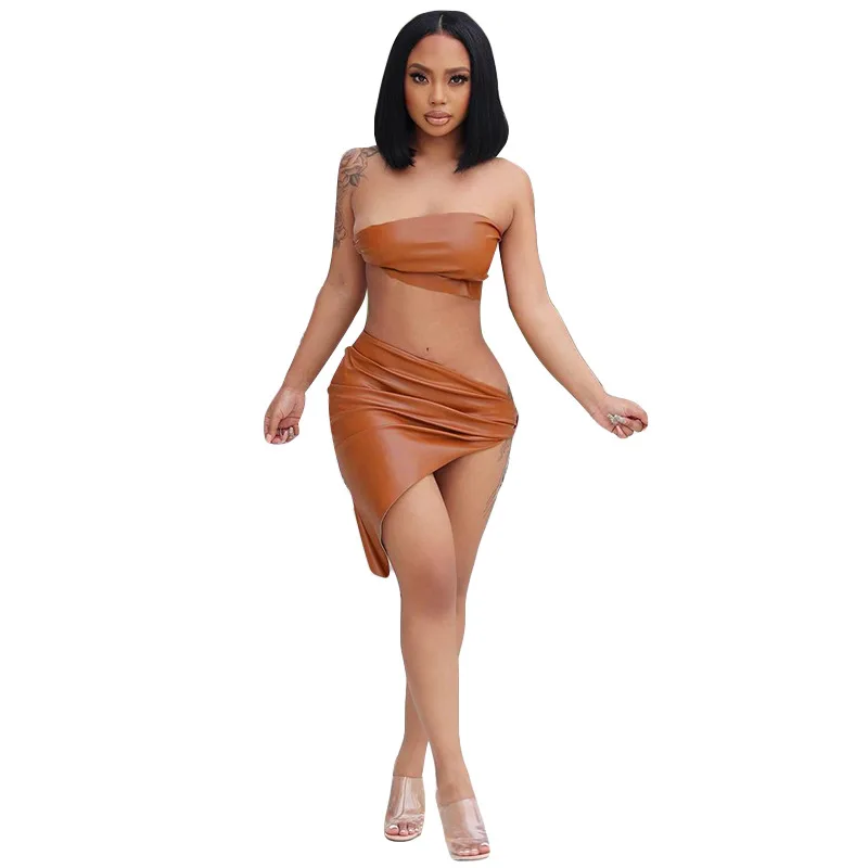 Custom Logo 2021 summer off shoulder designs women PU leather two pieces top with skirt set
Custom Logo 2021 summer off shoulder designs women PU leather two pieces top with skirt set