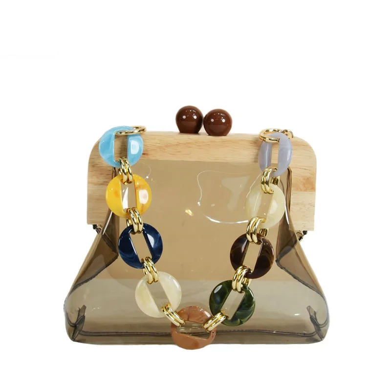 New fashion trend Candy Color Jelly transparent PVC acrylic wood clip cross arm chain bag 
New fashion trend Candy Color Jelly transparent PVC acrylic wood clip cross arm chain bag