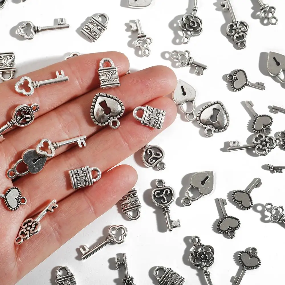 20-30pcs/bag Metal Silver Key Lock shape Charm Pendant For DIY Jewelry Earring Necklace Bracelet Making, Sliver
20-30pcs/bag Metal Silver Key Lock shape Charm Pendant For DIY Jewelry Earring Necklace Bracelet Making, Sliver